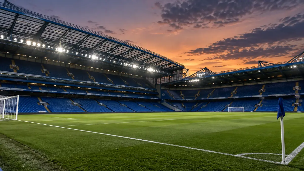 Empty English football stadium with blue seating