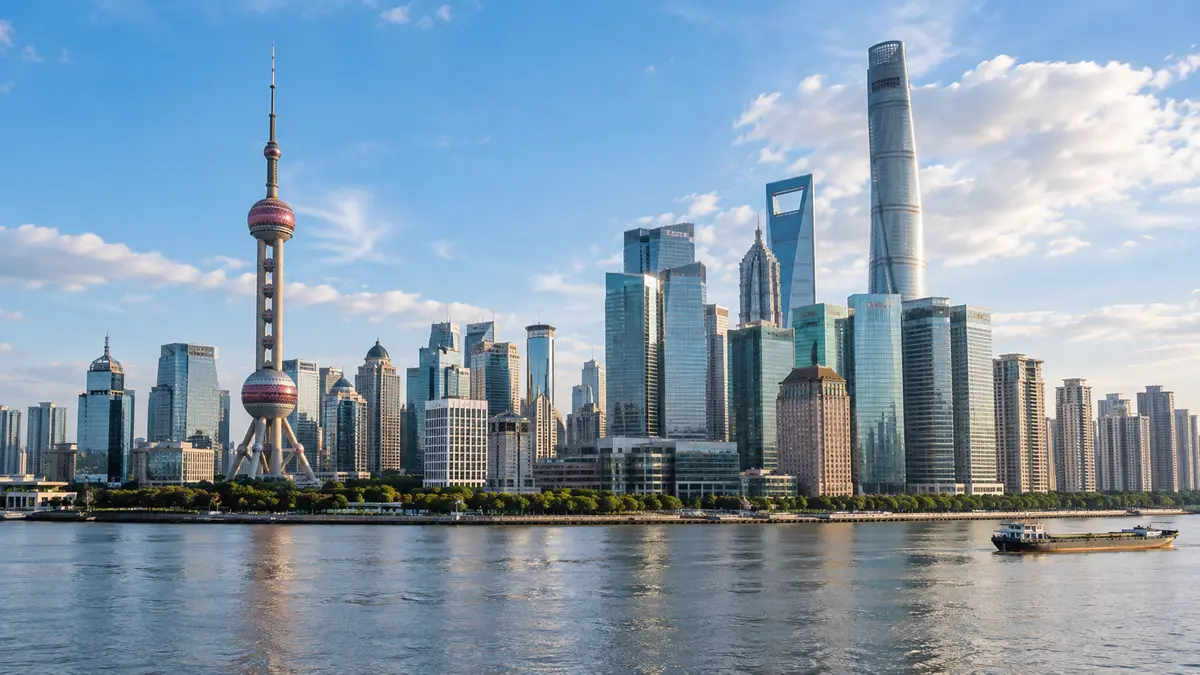 Shanghai financial district towers beside a river in natural daylight